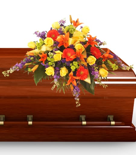 A Light Shines Through Casket Spray